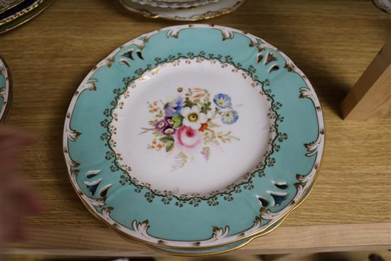 A small collection of decorative floral painted dessert dishes